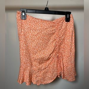 Pink and white dotted skirt